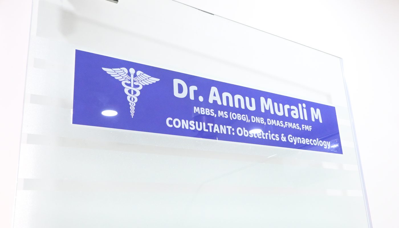 Dr. Annu Murali M name plate on the consultation room door